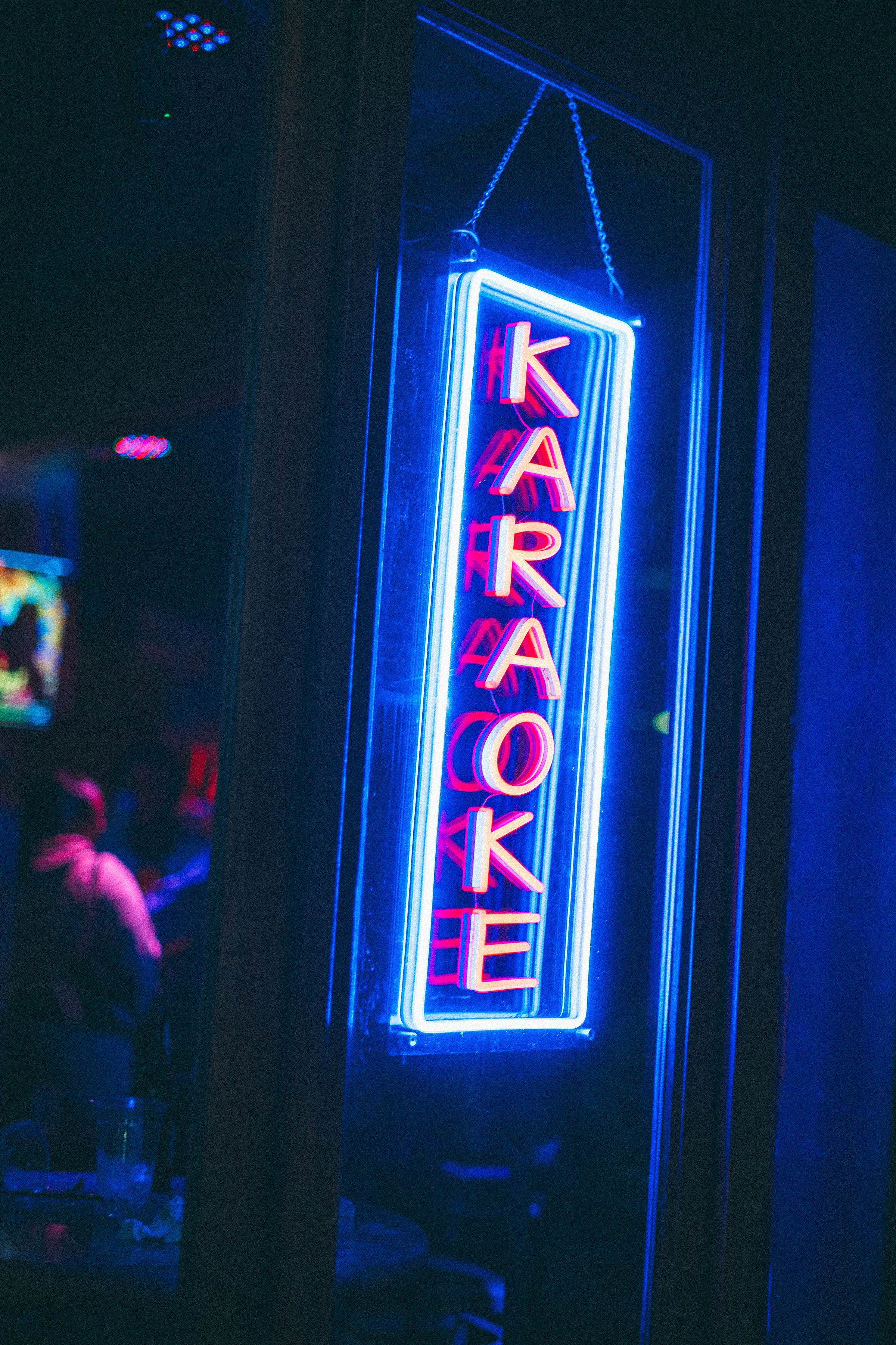 Karaoke neon sign at Ozzie's